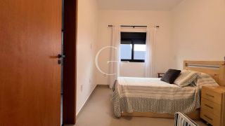 Casa Farm House térrea à venda no Condomínio UNA em Itu. Jardim com árvores frutíferas, 3 suítes e arquitetura com luz natural