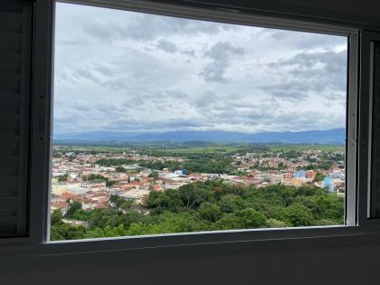 KITNET COM VISTA PARA A SERRA DA MANTIQUEIRA  COM MOBÍLIA E VAGA COBERTA