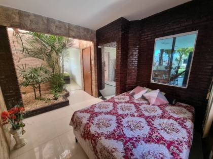 RESIDÊNCIA DE ALTO PADRÃO PRÓXIMA À PRAIA DE ATALAIA