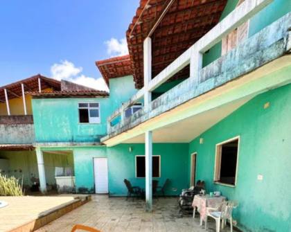 Casa em rua pública à Venda na Aruana