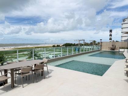 Apartamento de 1/4  frente mar a venda no Bayside Residence - Coroa do Meio