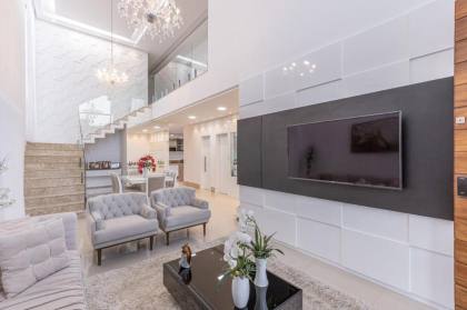 Casa à venda no Condomínio Costa Marina -4/4 | 3 suítes | Frente Leste | Área gourmet e piscina