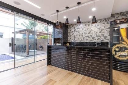 Casa à venda no Condomínio Costa Marina -4/4 | 3 suítes | Frente Leste | Área gourmet e piscina