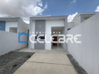 Casa com beco à venda