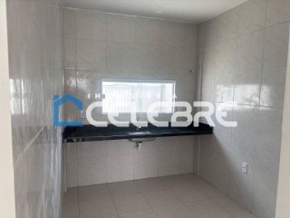 Casa com beco à venda