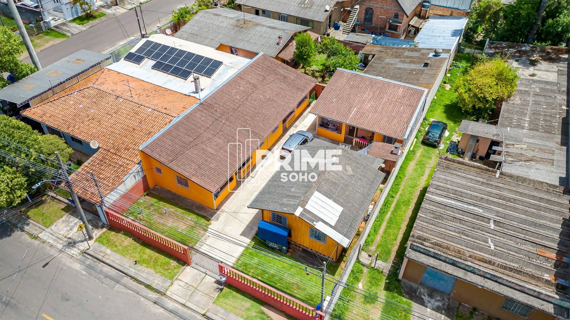 Terreno com 422m² e 4 Casas à Venda no Uberaba