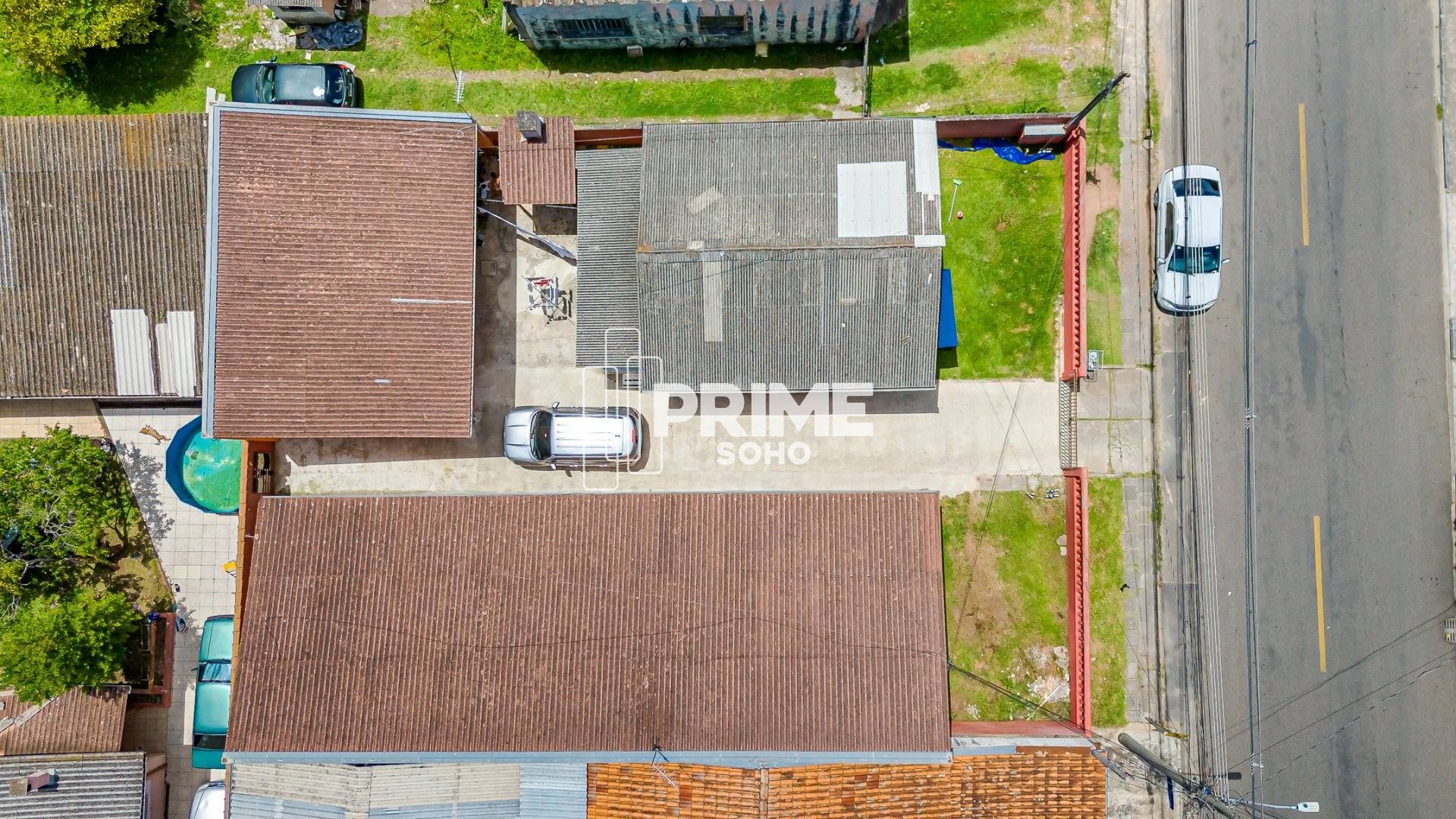 Terreno com 422m² e 4 Casas à Venda no Uberaba