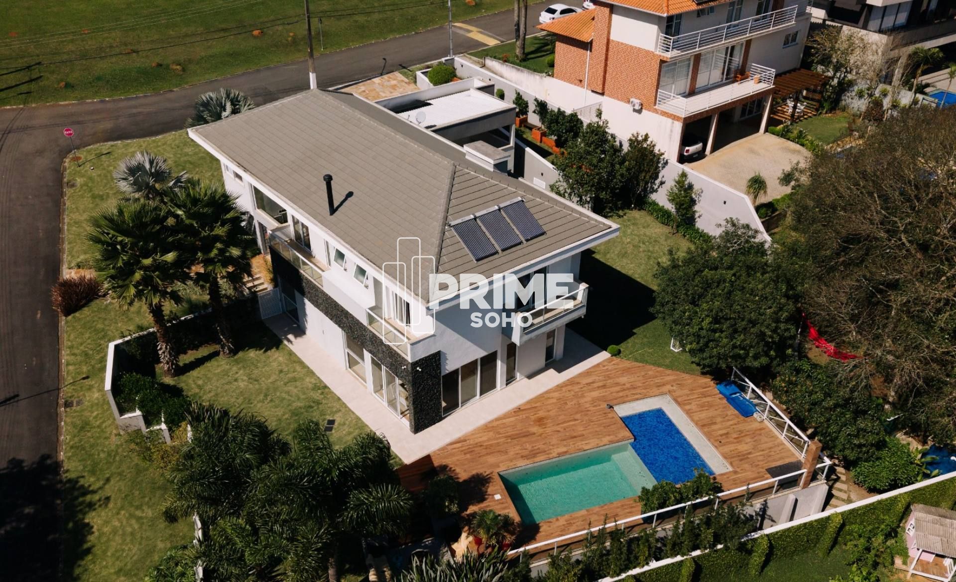 Casa em condomínio à venda com 430m², 4 suítes e terreno de 1.228m²