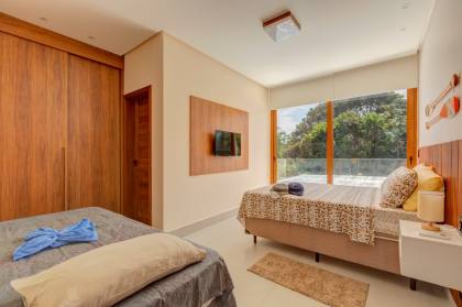 Casa de Condomínio Para Vender com 5 quartos 5 suítes no bairro Praia do Forte em Mata De São João