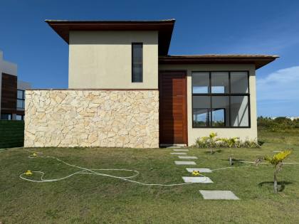 Casa de Condomínio Para Vender com 5 quartos 5 suítes no bairro Praia do Forte em Mata De São João