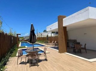 Casa em Condomínio à venda com 4 suítes, tem 195m2 de área total em Abrantes-Lauro de Freitas - Ba