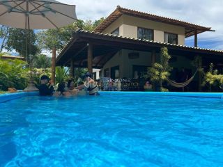 Casa de Condomínio  4 suítes  Praia do Forte em Mata De São João