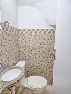 Casa de Condomínio Para Vender com 4 quartos 2 suítes no bairro Buraquinho em Lauro De Freitas