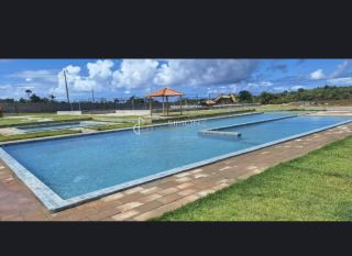 Lote / Terreno de Condomínio Para Vender em Arembepe : Condomínio Smart City Costa de Arembepe.