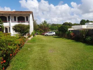 Casa de Condomínio Para Vender com 3 quartos 3 suítes no bairro Barra do Jacuípe em Camaçari