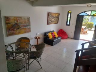 Casa de Condomínio Para Vender com 3 quartos 3 suítes no bairro Barra do Jacuípe em Camaçari