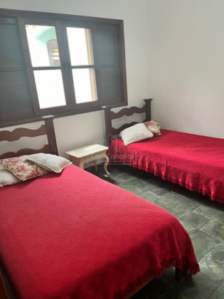 Casa de Condomínio Para Vender com 4 quartos 2 suítes no bairro Balneário Califórnia em Caraguatatuba