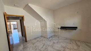 Lindos sobrados com 2 dormitórios sendo 1 suíte 2 vagas de Garagens e quintal no Éden