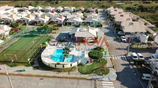 Casa em condomínio fechado na Aruana,com 3/4, sendo 1 suíte