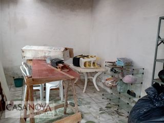 Casa com 2/4 em boa localização na Aruana