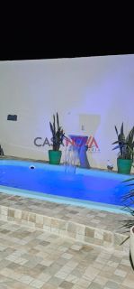 Casa com piscina na Caueira