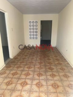Casa com 4/4 no bairro Suíssa