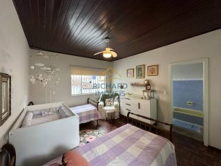 Casa Para Vender com 6 quartos 3 suítes no bairro Centro em Paracatu