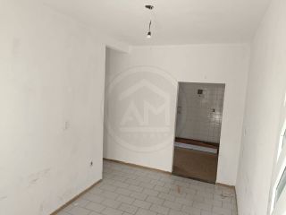 CASA NO CENTRO COMERCIAL DA BARRA