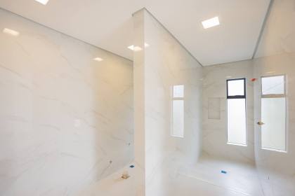 Sobrado geminado 3 suítes no América