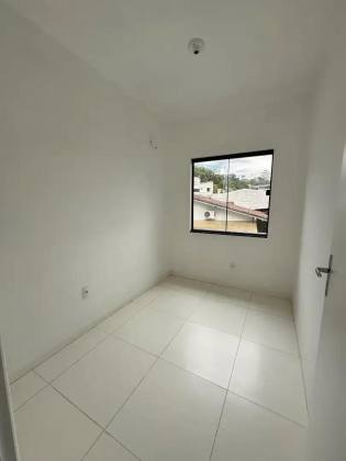 Sobrado geminado em condomínio fechado no Santa Catarina