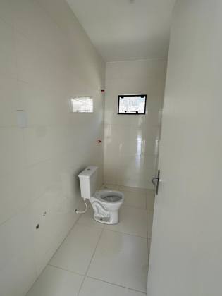 Sobrado geminado em condomínio fechado no Santa Catarina