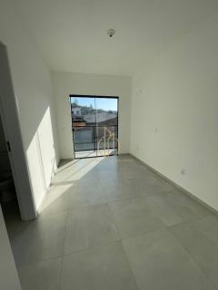 Sobrado geminado 2 quartos em condomínio fechado no Santa Catarina