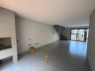 Sobrado geminado em condomínio fechado no Jardim Sofia