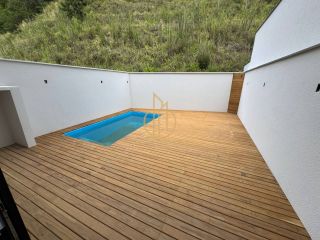 Sobrado geminado em condomínio fechado no Jardim Sofia