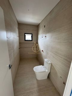 Sobrado geminado em condomínio fechado no Jardim Sofia