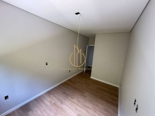 Sobrado geminado em condomínio fechado no Jardim Sofia