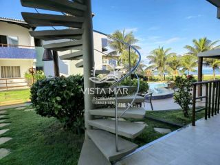 Apartamento térreo 2 Suítes pé na areia à venda em Itacimirim Bahia