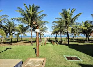Apartamento térreo 2 Suítes pé na areia à venda em Itacimirim Bahia