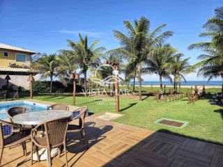 Apartamento térreo 2 Suítes pé na areia à venda em Itacimirim Bahia