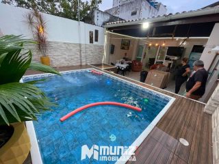 vende-se casa com piscina e 01 escritório ao lado no bairro Suissa