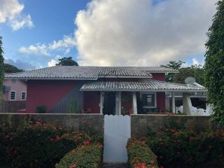 Casa de Condomínio Para Vender com 4 quartos 4 suítes no bairro Guarajuba em Camaçari