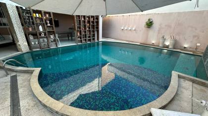 CASA DE ALTO PADRÃO NO CONDOMÍNIO SANTO ANTÔNIO COM 5 QUARTOS, 3 SUÍTES, 2 AMPLOS CLOSET, 7 BANHEIROS, PISCINA E MUITO MAIS! - ITABAIANA/SE