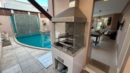 CASA DE ALTO PADRÃO NO CONDOMÍNIO SANTO ANTÔNIO COM 5 QUARTOS, 3 SUÍTES, 2 AMPLOS CLOSET, 7 BANHEIROS, PISCINA E MUITO MAIS! - ITABAIANA/SE