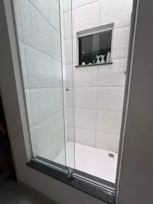 Casa com: 5 quartos, 3 suítes, no Centro de Itabaiana.