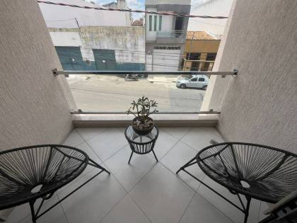 Casa com: 4 quartos, 1 suíte, piscina, área gourmet, e muito mais! E excelente localização no Centro de Itabaiana.