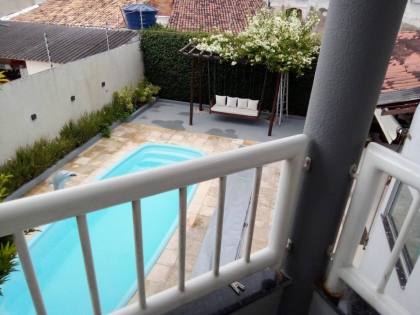 Casa sofisticada e mobiliada, com 6 quartos, 5 banheiros, 4 vagas de garagem, e muito mais! No bairro Serrano em Itabaiana