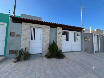 Casa ampla e confortável, com 3 quartos, 1 suíte, e muito mais! no bairro