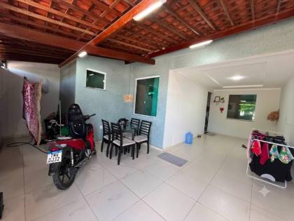Casa ampla e confortável, com 3 quartos, 1 suíte, e muito mais! no bairro
