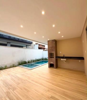 Casa de Condomínio Padrão Americano com 3 suítes no
