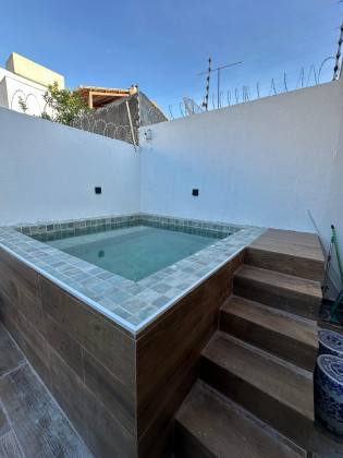 CASA EM RUA PÚBLICA NA ARUANA
